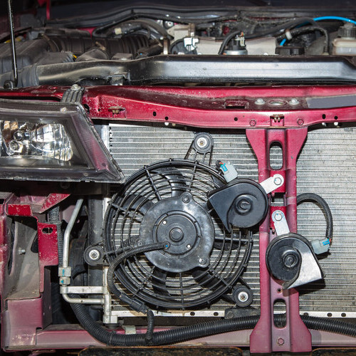 closeup of an engine cooling fan on a radiator
