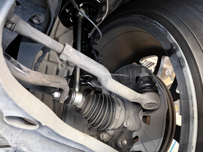 tie rod in the undercarriage of a car