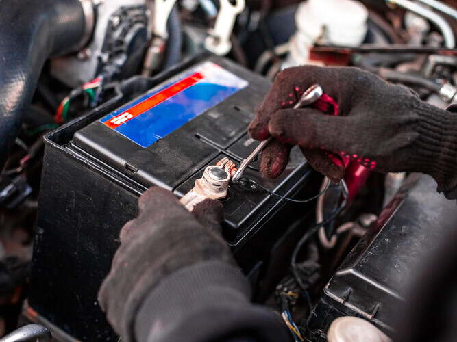 Installing a new car battery. 
